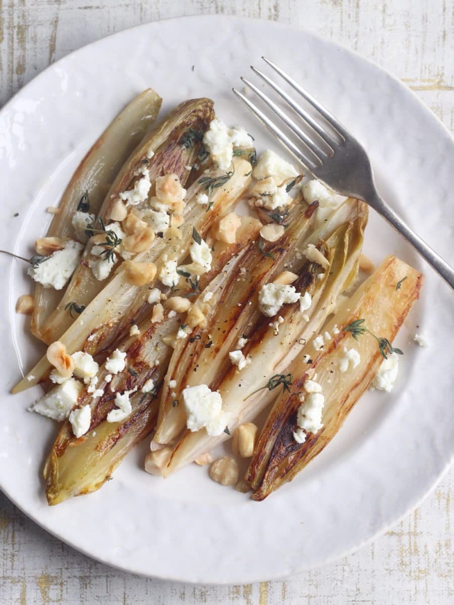 Pan-fried Chicory (Belgian Endive) with Crumbled Feta and Hazelnuts