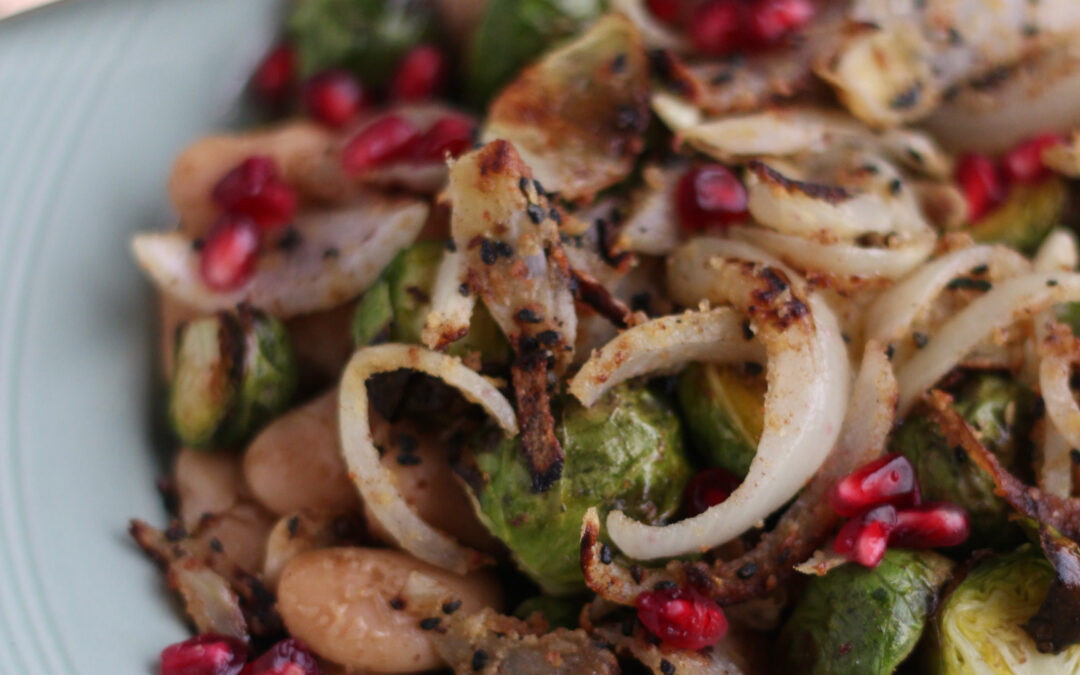 Warm Brussels & Butter Beans with Nigella Seed Crispy Onions