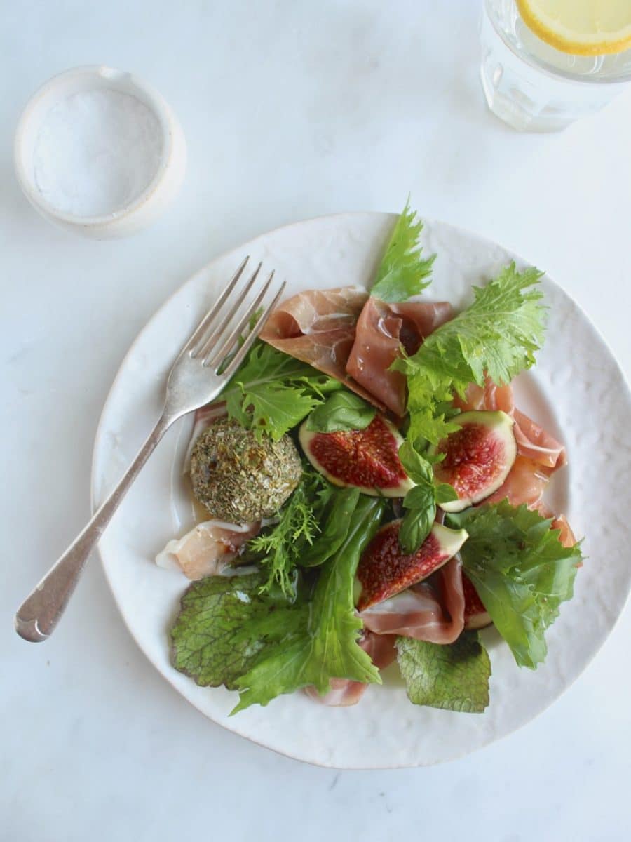 Herb Rolled Cashew Cheese with Parma Ham, Figs & Leaves