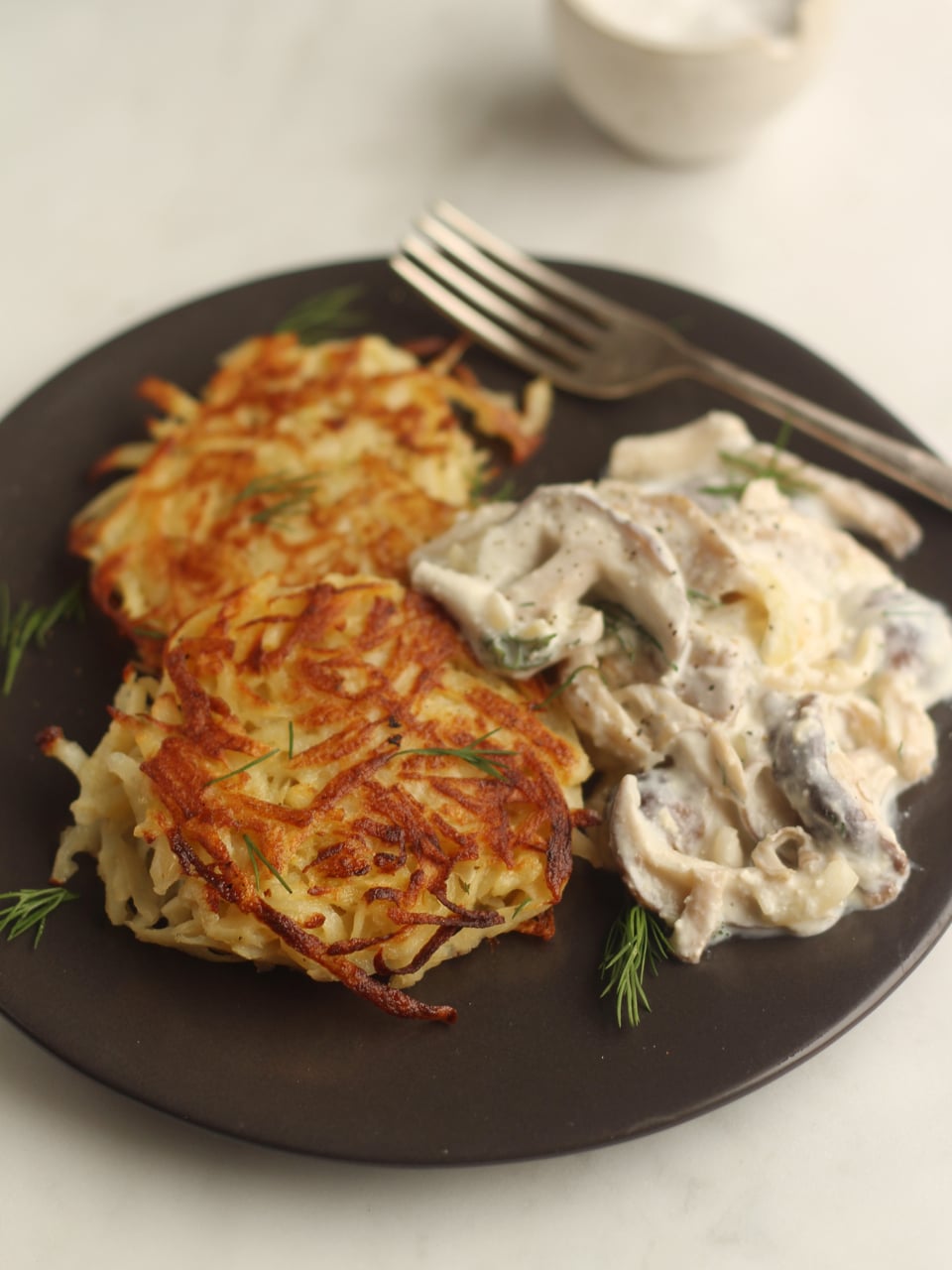 Potato Pancakes with Mushroom Sauce a vegetariian recipe from Ren Behan's Wild Honey and Rye, Modern Polish Recipes