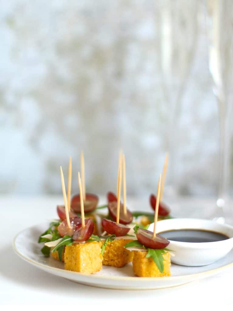 Parmesan Polenta Bites with Rocket & Grape, a Christmas canapé on Natural Kitchen Adventures, gluten free