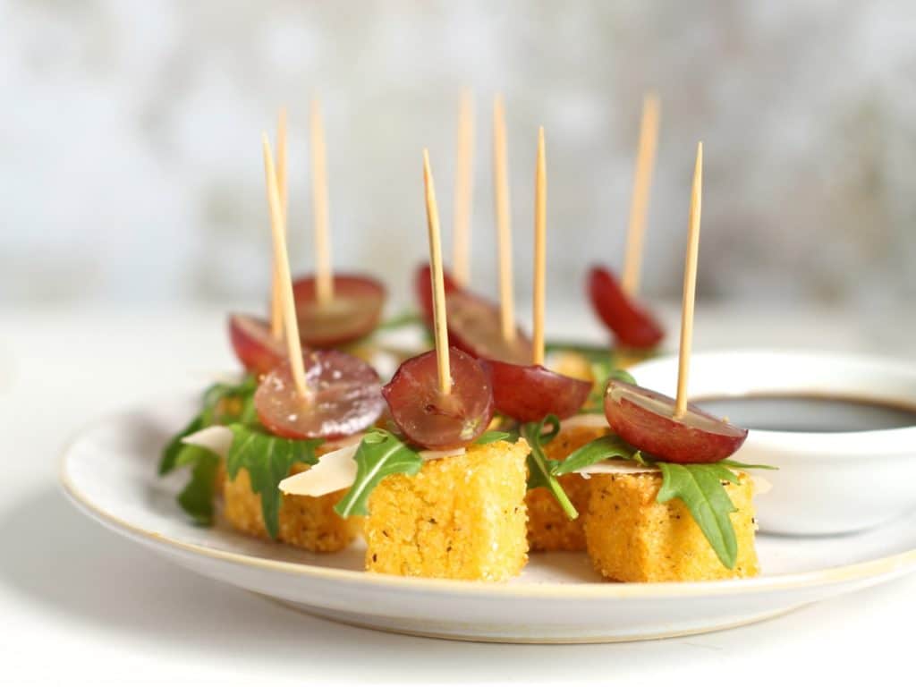 Parmesan Polenta Bites with Rocket & Grape, a Christmas canapé on Natural Kitchen Adventures, gluten free