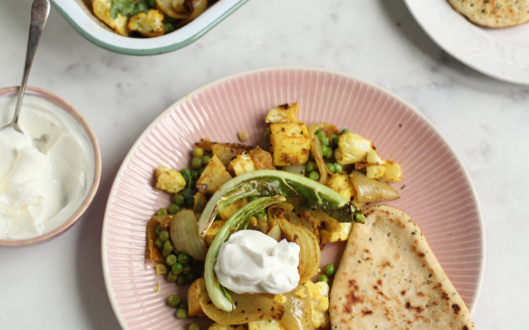 Spiced Cauliflower & Paneer Tray Bake with Buttery Onions and Peas